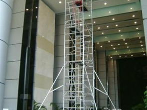 廣州租售廠房消防吊頂專用電動剪叉式液壓升降平臺與附著式升降腳手架應(yīng)用指南